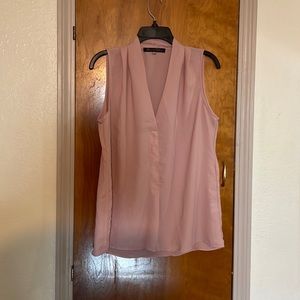 Pink sleeveless blouse